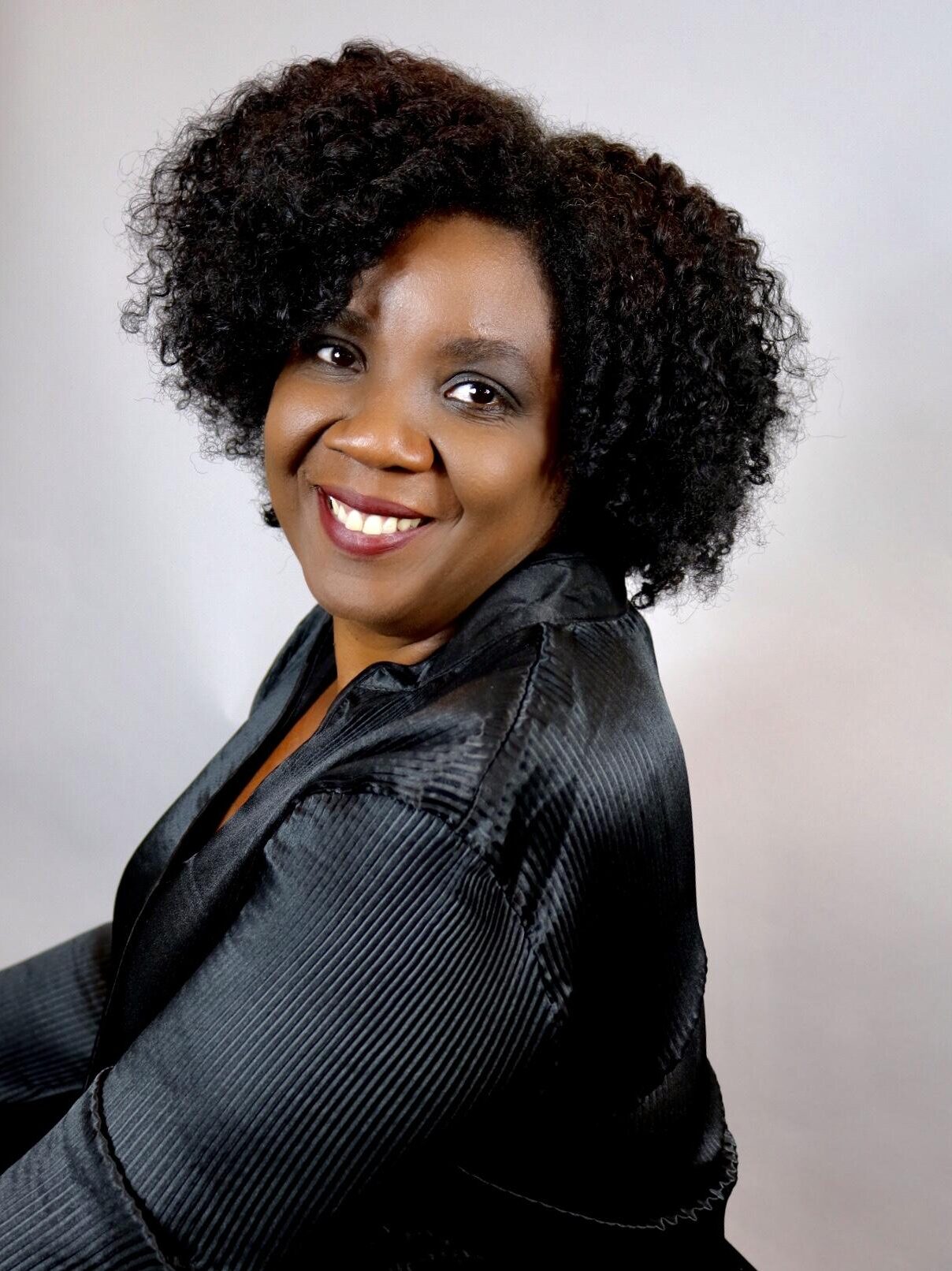 Ms. Adriane Hughes